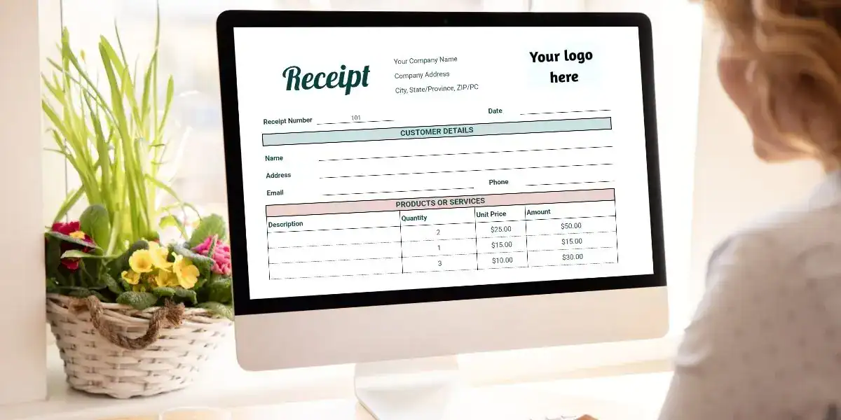 A computer screen displays a Google Sheets receipt template with editable fields for customer details and a table listing product descriptions, quantities, unit prices, and amounts. A woman is seated at the desk, and a woven basket of colorful flowers is placed by the window.