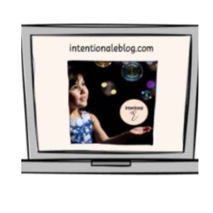 image of a cartoon computer with a child on the screen staring in awe at bubbles and holding a bubble that says Intentional e